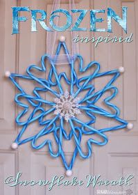 a frozen snowflake hanging from the side of a door