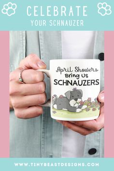 a woman holding a coffee mug with an elephant saying celebrate your schnauzer