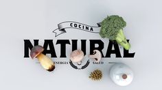 broccoli, mushrooms, and other vegetables are displayed on a white surface with the word natural