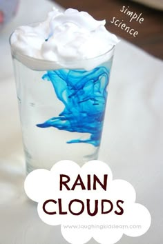 a close up of a glass with liquid in it and the words rain clouds written below