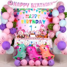 a birthday party with balloons and decorations