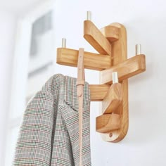 the coat rack is made out of wood