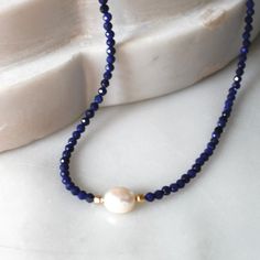 Natural Lapis Necklace for Women, Birthday Gifts for HerStunning and chic this beaded lapis lazuli necklace is the perfect everyday necklace or gift. Lapis is know as the friendship stone!•Gorgeous, genuine and natural 3mm lapis lazuli beaded by hand with freshwater pearl•Adorned with 14kt gold filled accents Water friendly Diy Pearl Necklace, Women Birthday Gifts, Beaded Necklace Patterns, Lapis Necklace, Pearls Diy, Lapis Lazuli Necklace, Lapis Lazuli Beads, The Friendship, Beading Jewelry