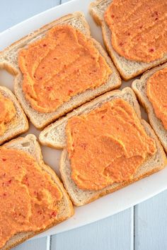 several pieces of bread with peanut butter on them