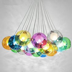 a multicolored chandelier hanging from the ceiling