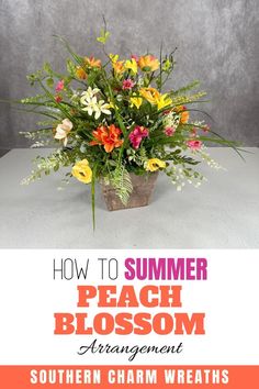 an arrangement of flowers in a pot with text overlay that reads how to summer peach blossom arrangement southern charm wreaths