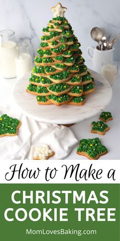 a christmas tree made out of cookies on top of a white plate with green icing