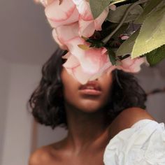 a woman with flowers in her hair