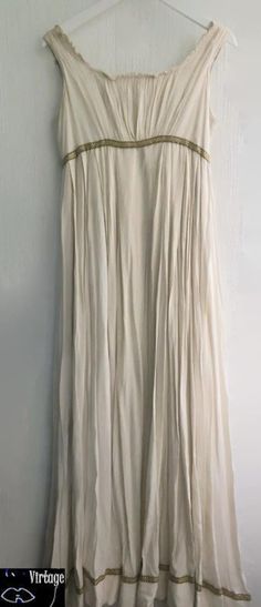 Dress Antique greek dress Empire white theatre costume dress gown siZe s  lenght from waist line (lifted waistline) 107cm Double layered dress heavy falling viscose Lining cotton upper non stretchy  Gold Antique trimming  Condition good, some marks of time Roman Dress Ancient, Roman Women Dress, Ancient Rome Clothing, Ancient Greek Dress, Ancient Egyptian Fashion, Greek Style Dress, 20’s Fashion, Ancient Greek Clothing, Roman Dress