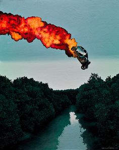 a car is flying through the air with fire coming out of it's back