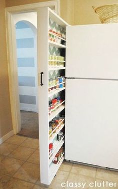 an open pantry door in the corner of a kitchen