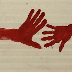 two red hands reaching for each other