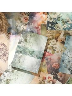 an assortment of paper with flowers on them