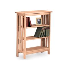 a wooden book shelf with books on it