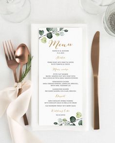 an elegant menu with pink flowers and greenery