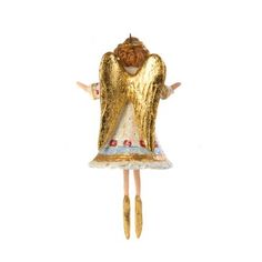 a gold angel figurine hanging from a white wall