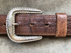 "c. 1995 Tony Lama. Made in USA. Marked a size 30. Chunky silver tone buckle. Fits approx 28\"-32\" waist on 5 notches. Recommended for 28\"-30\".  1 3/8\" wide" Brown Belt Silver Buckle, Thick Belt, Western Belt, Tony Lama, Mens Fashion Streetwear, Western Belts, Jewellery Ideas, Brown Belt, Waist Chain