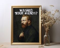 a framed portrait of a bearded man with the words washed your hands?