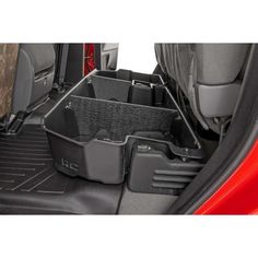 Clean up the contents of your cab with Rough Countrys Custom-Fit Under Seat Storage Compartment. These handy under seat truck storage compartments offer an easy way to store your gear with a custom, contoured look that blends in seamlessly with your vehicles factory design. Keep your tools, gear, and other odds and ends organized and stowed away while conveniently stowed away under the rear seats. Each under seat storage tray is constructed from a durable, high-density thermoplastic material tha Toyota Tundra Accessories, Chevy Trucks Accessories, Tundra Accessories, Truck Bed Organization, Truck Organization, Under Seat Storage, Tundra Truck, Cool Truck Accessories, Truck Bed Storage