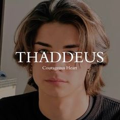 a young man wearing a black shirt with the words thaddeus on it