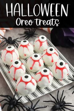 halloween oreo treats with white chocolate and red sprinkles on a plate