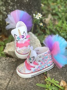 Unicorn Custom Converse -Tutu in back of the shoe varies in color amount. It's never the same. If you like more of the same color on the back please message me or put it in the notes. - If you would like to see certain things on shoe please message me for examples. - Processing time takes 2 - 3 weeks. Please advise that shipping time is different from processing time. If needed sooner than 2 - 3 weeks please message me before placing order. Glitter Converse, Bling Converse, Unicorn Themed Birthday Party, Baby Birthday Decorations, Rainbow Shoes, Custom Bling, Unicorn Costume, Custom Converse