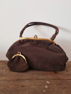 Description: 1940s Brown Suede Handbag with Purse. Made in England. Measurements: WIDTH: 32cm,  HEIGHT: 20cm Vintage Bags For Daily Use, Vintage Satchel With Removable Pouch For Formal Use, Vintage Pouch Satchel For Evening, Vintage Satchel Bag With Removable Pouch, Vintage Pouch Satchel, Vintage Pouch Satchel For Daily Use, Retro Top Handle Satchel In Vintage Brown, Vintage Brown Bag With Leather Handles, Vintage Brown Bags With Detachable Handle