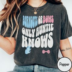 a woman with long hair wearing a black shirt that says burnins or bows only annie knows