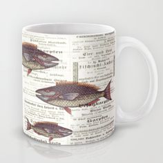 a coffee mug with fish printed on it