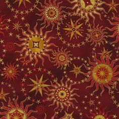 a red background with gold stars and sun designs on it's sides, as well as in the center