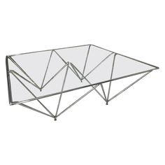 a glass and metal coffee table with two intersecting sections on each side, viewed from the top