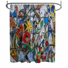 a shower curtain that has been decorated with colorful stained glass and metal elements on it