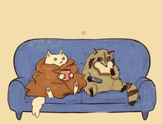 two cats are sitting on a couch and one is holding a remote control