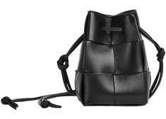 The Bottega Veneta Cassette Mini Intrecciato Bucket Bag encapsulates modern sophistication with a touch of artisanal charm. Skillfully crafted with meticulous attention to detail, it features the brand's iconic Intrecciato weaving technique, showcasing exquisite craftsmanship. The compact bucket silhouette offers a contemporary twist, while the Cassette motif adds a touch of elegance. With its versatile design and adjustable strap, this bag seamlessly transitions from day to night, making it per Bottega Veneta Cassette, Balenciaga Designer, Bottega Veneta, Designer Shoes, Luxury Bags, Bucket Bag, Timeless Fashion, Bags Designer, Adjustable Straps