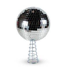 a silver disco ball on a metal stand