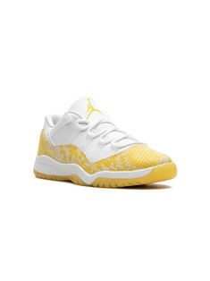 white/yellow calf leather signature Jumpman motif round toe front lace-up fastening logo-embroidered tongue rubber sole These styles are supplied by a premium sneaker marketplace. Stocking only the most sought-after footwear, they source and curate some of the most hard to find sneakers from around the world. Air Jordan 11 Low, Jordan 11 Low, Cute Nike Shoes, Cute Nikes, Air Jordan 11, Kids Jordans, Jordan 11, Boys Shoes, Sneakers White