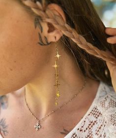 Hello, I am currently in Thailand. All orders are still being processed as usual and each package will be sent with a tracking number.  If you have any questions feel free to ask 🌞  The earring hooks and chain are made of stainless steel and stars are made of brass.  Length: 4.33 inch = 11 cm Starry sky earrings are a beautiful and unique piece of jewelry that captures the magic and wonder of the night sky. These earrings feature stars, which are symbols of guidance, hope, and wishes. The long Celestial Festival Earrings, Mystical Style Dangle Earrings, Handmade Celestial Dangle Earrings, Gold Celestial Crystal Dangle Earrings, Celestial 14k Gold Dangle Earrings, Bohemian Wedding Earrings, Long Chain Earrings, Korean Jewelry, Boho Fashion Bohemian