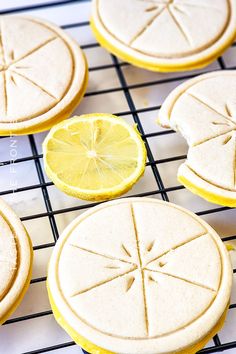 cookies with lemon slices on a cooling rack