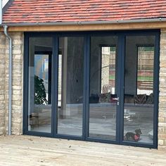 metal-folding-patio-door-clear-glass-4-panels Steel Patio Doors, Glass Bifold Doors, Bifold Patio Doors, Wrought Iron Entry Doors, Bifold Door, Iron Entry Doors, Bi Fold Door, Modern Entry, Door Sweep