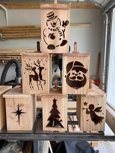 wooden blocks with christmas designs on them