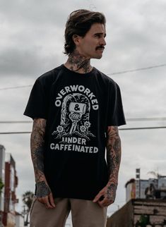 "Over Worked Under Caffeinated™", the motto of a generation. The Over Worked Under Caffeinated™ unisex crewneck t-shirt is made of high quality and comfy, vintage-inspired garment washed cotton blend fabric. Features: Black Comfy & High-Quality Cotton Blend Fashion-Fit, machine wash. Free Shipping in the US Vans Style Mens, Mens Alternative Fashion, Over Worked, Custom Keyboards, Band Tee Outfits, Masc Fashion, Tattoo Shirt, Dress Better, Street Fits