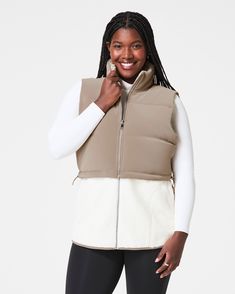 This two-in-one vest helps you brave the chill in style and comfort. On colder days where you need extra warmth and coverage all around, the zip-up long vest option will be your go-to layer. On slightly warmer days, simply remove the bottom fleece portion to reveal a perfectly cropped velour vest that flatters any high-waisted look. With convenient, fleece-lined hand pockets and a shock cord at the hem to define your waist, this fully-lined layer is every bit as flattering as it is versatile. | Spanx Women's Two-In-One Velour Fleece Vest Top Winter Stretch Ribbed Vest, Fleece Women Vest, Cropped Sherpa Vest, Brown Fleece Vest, Black Fleece-lined Vest For Fall, Long Vests, Fleece Vest, Vest Top, Cold Day