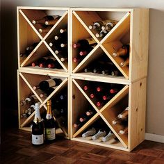 a wooden wine rack filled with lots of bottles