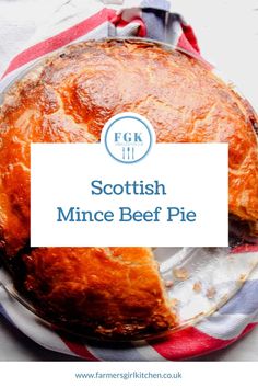 scottish mince beef pie on a plate with the title text overlay reads scottish mince beef pie