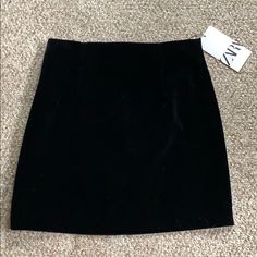 This Adorable Black Velour Skirt Is New With Tags! There Is Some Loose Stitching On The Back At The Bottom Of The Zipper But It Doesn’t Impact Wear. I’m Still Able To Zip It Up And Down And Nothing Shows! There’s Just Some String That Needs To Be Cut Or Sewn Down. Really Hardly Noticeable (Last Pic) Zara Black Pencil Skirt, Zara Black Stretch Mini Skirt, Zara Black Lined Mini Skirt, Zara Black Mini Length Skort, Zara Black Mini Skort, Zara Black Mini Skirt, Velour Skirt, Zara Skirts, Zara Black