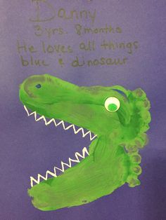 a child's drawing of a crocodile with words written on it