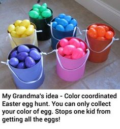 four buckets filled with colored eggs sitting on the floor next to an egg hunt