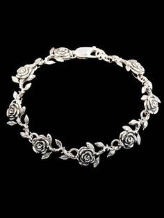 This detailed rose link bracelet comes in your choice of 8 Links ( 7.25" in length) or 9 Links (8.25" in length). Treat yourself or your special someone to this beautiful bouquet!This item usually ships the same or next business day.All Marty Magic Jewelry is packaged in a beautiful box, embossed with the gold foil Marty Magic dragon logo. Perfect for any occasion!Designed in Santa Cruz California by Marty Magic. Made in the U.S.A. Magical Artifacts, Etsy Bracelets, Silver Flower Bracelet, Magic Jewelry, Dragon Logo, Magic Dragon, Victorian Bracelet, Jewelry Victorian, Bracelet Flower