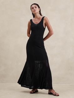 We selected one of our favorite all-season yarns for this maxi dress, employing a range of textured, open stitches to mimics the look and feel of crochet and pointelle styles.  Here, we added a removable knee-length slip, allowing you to dress it up or down as the occasion calls.  Fit & Flare: Fitted through the chest, empire waist, A-line skirt.  Sustainability: Made with LENZING™ ECOVERO™, a breathable fiber derived from certified renewable wood sources, produced using methods that reduce water impact and emissions by up to 50% compared to traditional viscose.  Sweetheart neckline.  Pull-on design.  Removable knee-length slip with adjustable slider straps.  Fit & Flare: Fitted through the chest, empire waist, A-line skirt.  Sleeveless.  Maxi length.  Model: Size S, 5'10" (178cm). Black Crochet Dress, Lace Maxi, Lace Maxi Dress, Black Maxi Dress, Cocktail Dress Party, A Line Skirt, Crochet Dress, Empire Waist, Fit & Flare