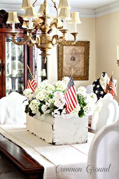 an american flag centerpiece on a dining room table